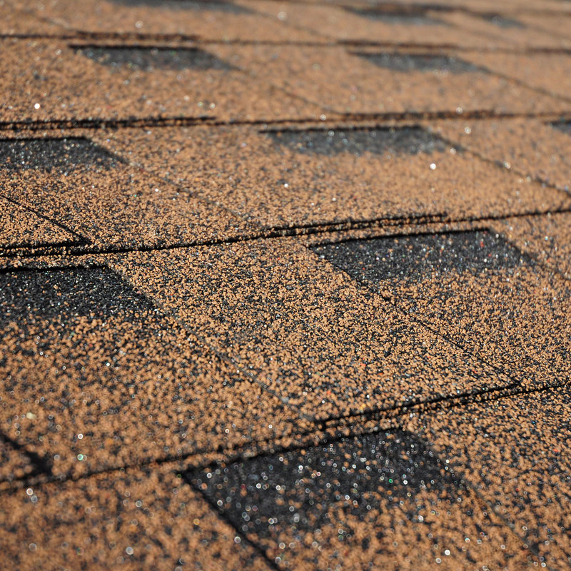 Asphalt shingle roof with brown shingles